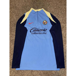 Nike Men’s Blue Club America Academy ADV Strike Team Issue Drill Top Sample